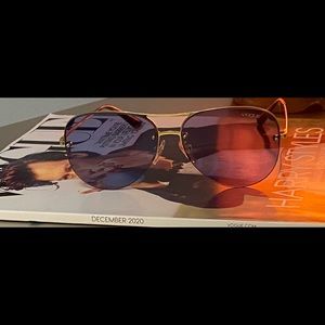 Vogue Sunglasses.